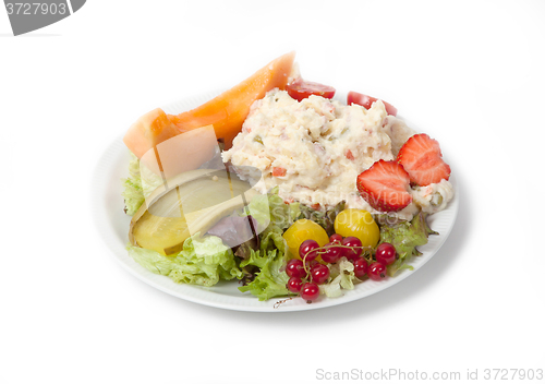 Image of Snack time - View of Russian salad on a white plate