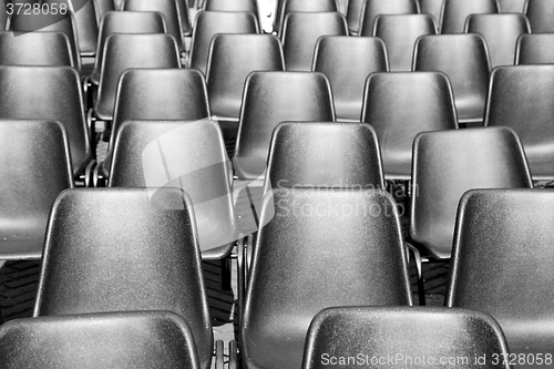 Image of empty seat in italy europe background black  texture