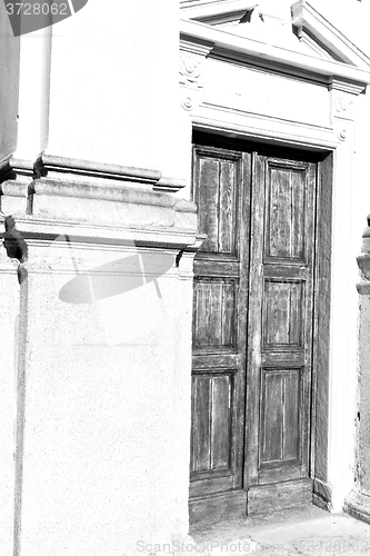 Image of detail in  wall door  italy land europe architecture and wood th