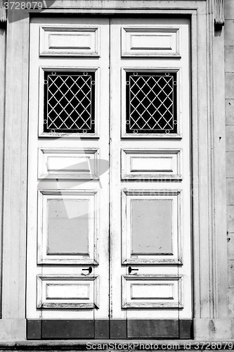 Image of detail in  wall door  italy land europe architecture and wood th