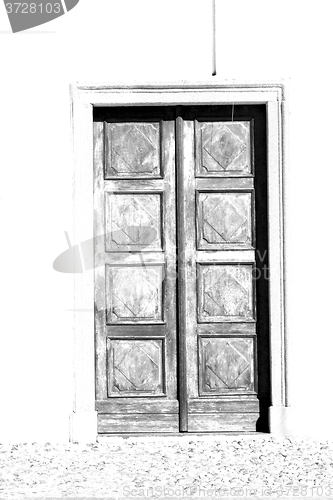 Image of detail in  wall door  italy land europe architecture and wood th