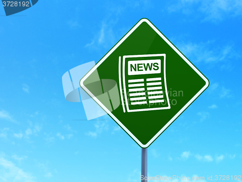 Image of News concept: Newspaper on road sign background