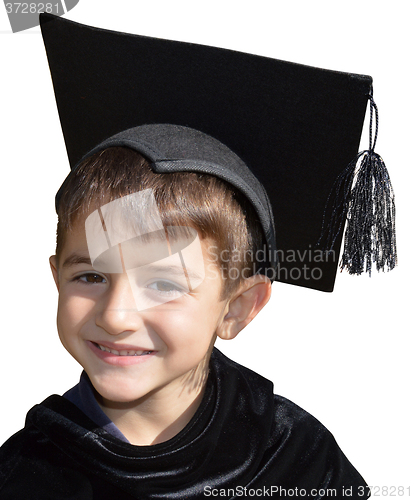 Image of Cute kid graduate with graduation cap