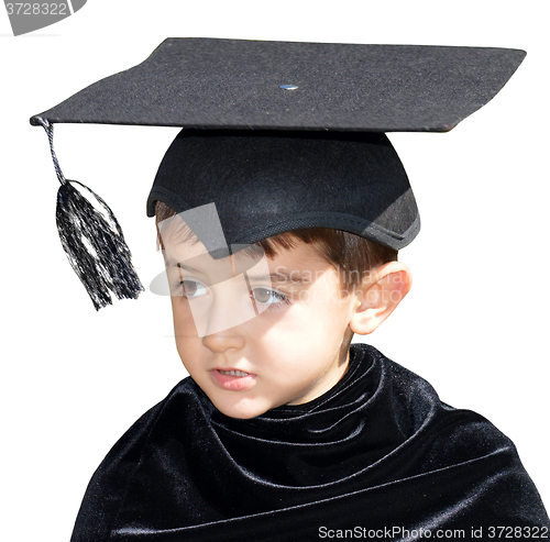 Image of Cute kid graduate with graduation cap