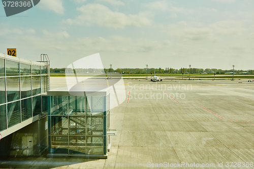 Image of Airplane at the terminal gate ready for takeoff 