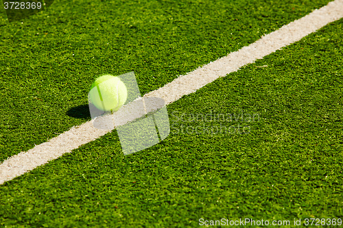 Image of Tennis Ball on the Court