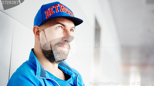 Image of Profile of a handsome man wearing cap