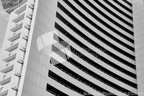 Image of angle view to textured background of modern glass building 