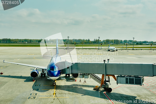 Image of Airplane at the terminal gate ready for takeoff 