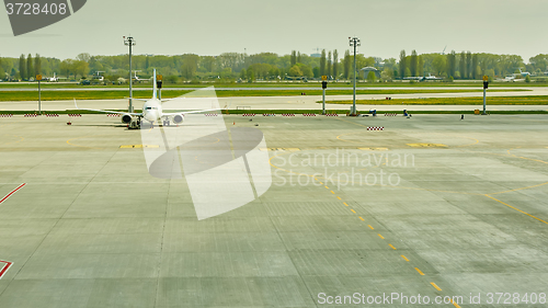 Image of Airplane at the terminal gate ready for takeoff 