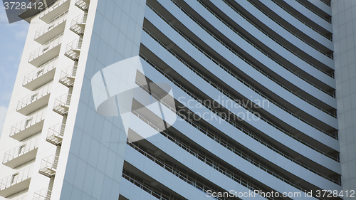 Image of angle view to textured background of modern glass building 