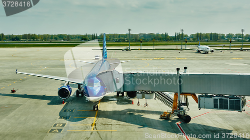 Image of Airplane at the terminal gate ready for takeoff 