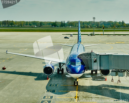 Image of Airplane at the terminal gate ready for takeoff 