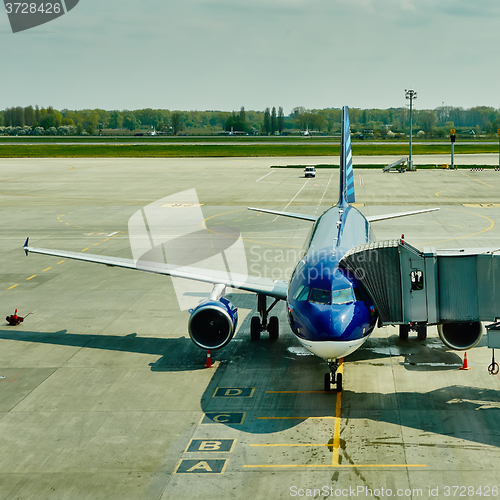 Image of Airplane at the terminal gate ready for takeoff 