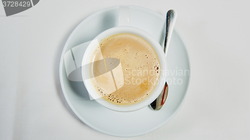 Image of cup of fresh espresso on table,