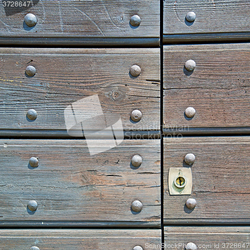 Image of europe old in  italy  antique close brown door and rusty lock  c