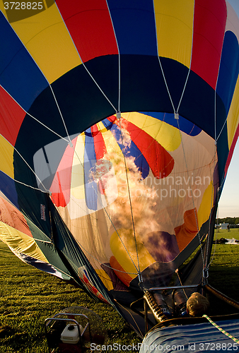Image of Hot air balloon being inflated in preparation for flight