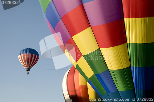 Image of Colorful hot air balloons launching