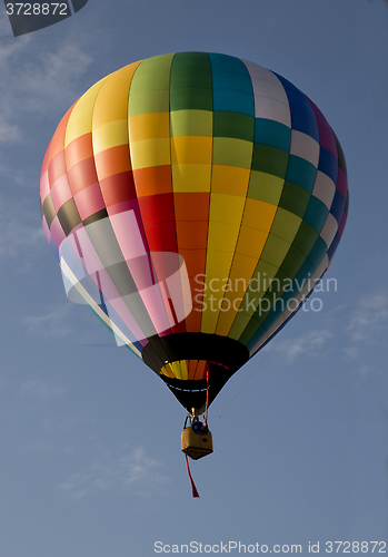 Image of Hot air balloon launching against a blue sky