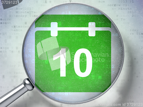Image of Time concept: Calendar with optical glass on digital background