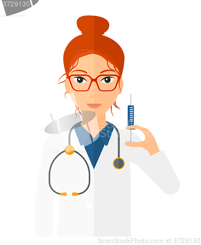 Image of Doctor holding syringe.