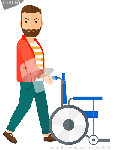 Image of Man pushing wheelchair.