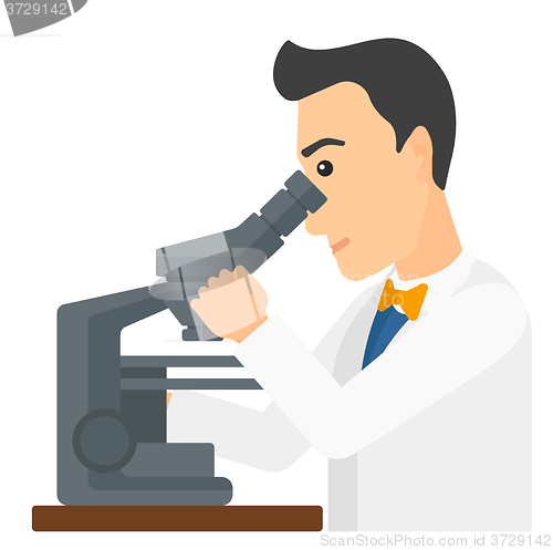 Image of Laboratory assistant with microscope.