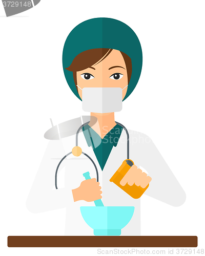 Image of Pharmacist preparing medicine.