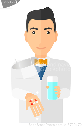 Image of Pharmacist giving pills.