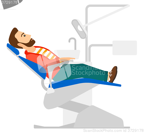 Image of Patient in dental chair.