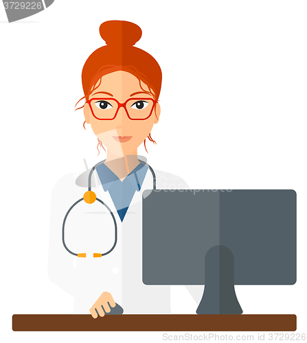 Image of Pharmacist standing at counter.