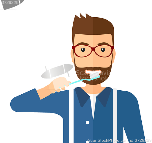 Image of Man brushing teeth.