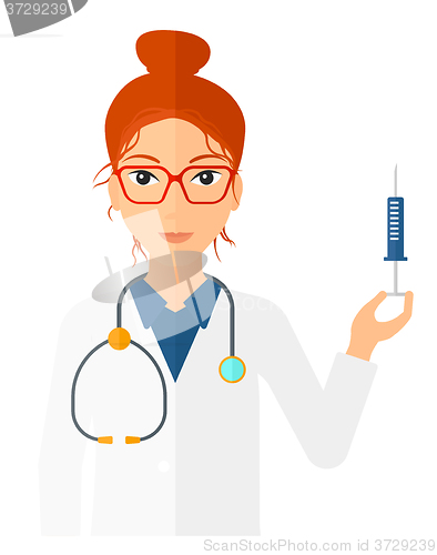 Image of Doctor holding syringe.