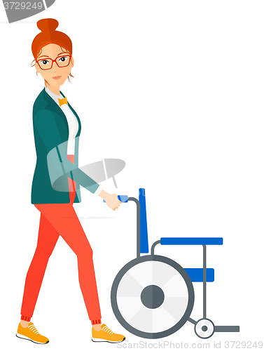 Image of Woman pushing wheelchair.