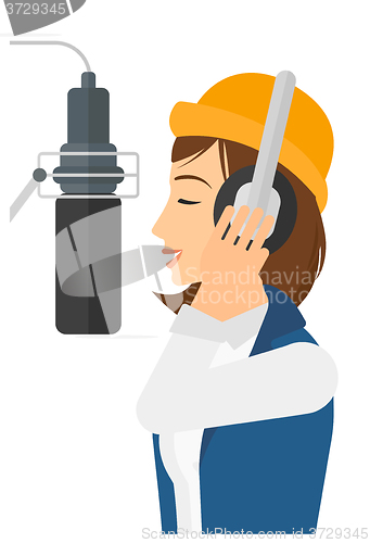 Image of Singer making record. 
