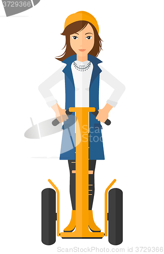 Image of Woman riding on segway.