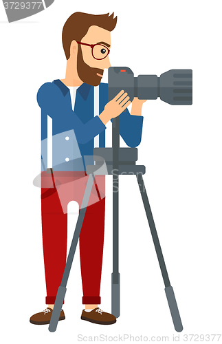 Image of Photographer working with camera.