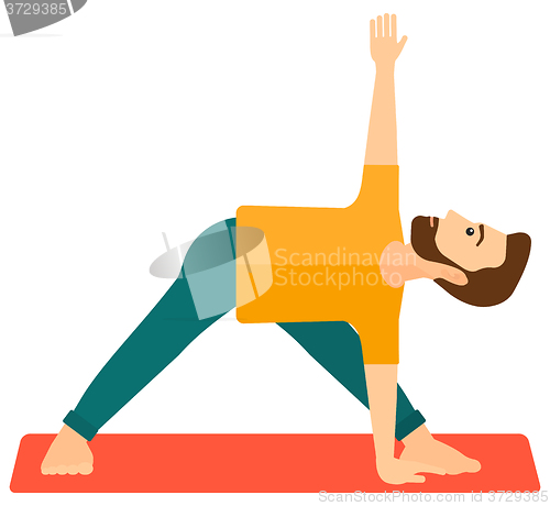 Image of Man practicing yoga.