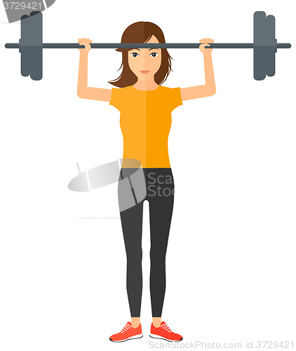 Image of Woman lifting barbell.