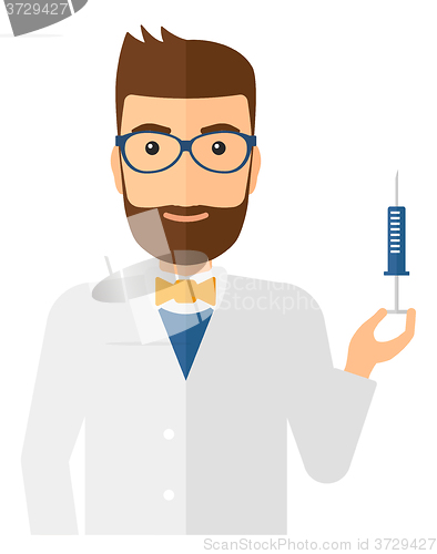 Image of Doctor holding syringe.