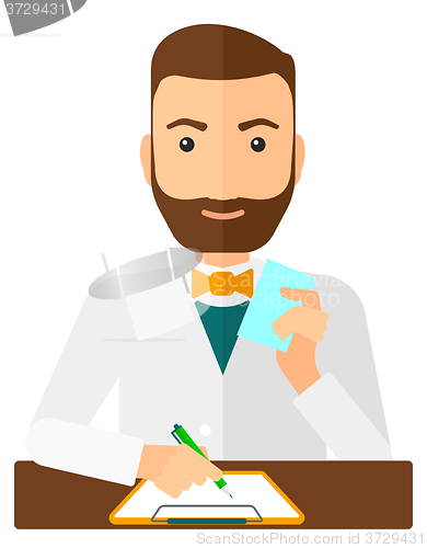 Image of Pharmacist taking notes.