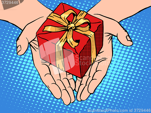 Image of Male hands heart shape gift box