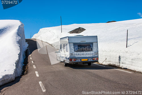 Image of Caravan car travels on the highway.