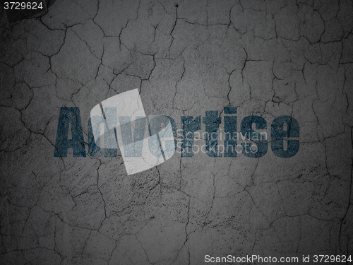 Image of Advertising concept: Advertise on grunge wall background