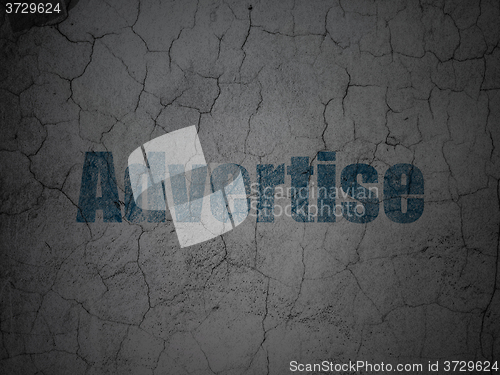 Image of Advertising concept: Advertise on grunge wall background