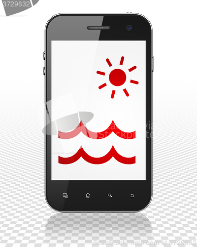 Image of Vacation concept: Smartphone with Beach on display