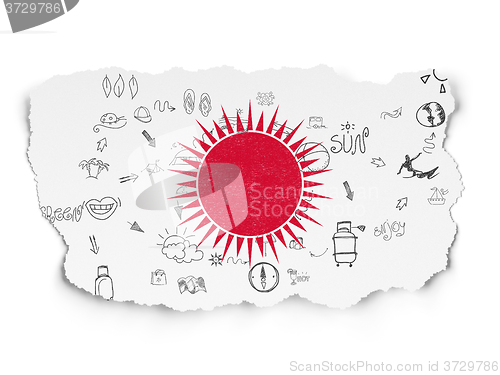 Image of Travel concept: Sun on Torn Paper background