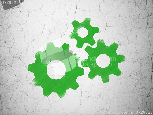 Image of Marketing concept: Gears on wall background