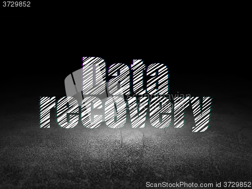 Image of Data concept: Data Recovery in grunge dark room