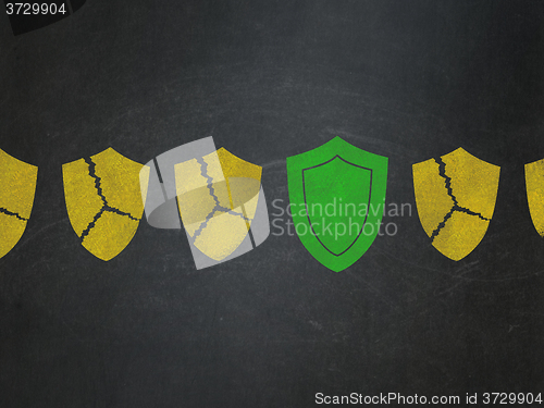 Image of Protection concept: shield icon on School Board background